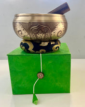 Load image into Gallery viewer, singing bowl with decorative design and wooden striking stick with buddha.