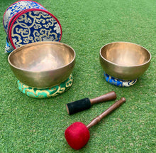 Load image into Gallery viewer, Handmade Singing Bowl Set of 2 – 7.5" A Note Third Eye Chakra &amp; 8" F Note Heart Chakra with 2 Mallets &amp; Carry Bag
