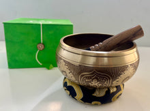 Load image into Gallery viewer, singing bowl with decorative design and wooden striking stick with buddha

