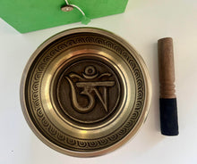 Load image into Gallery viewer, singing bowl with Om symbol and wooden mallet on a white background
