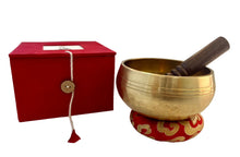 Load image into Gallery viewer, Brass singing bowl with wooden striker and red box on a white surface
