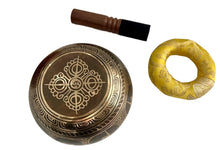 Load image into Gallery viewer, Singing bowl with intricate design, wooden handle, and gold ring on a white background
